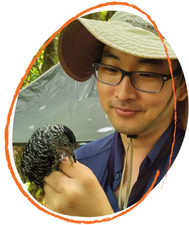 Postdoctoral Researcher Seokmin Kim working with a bird species